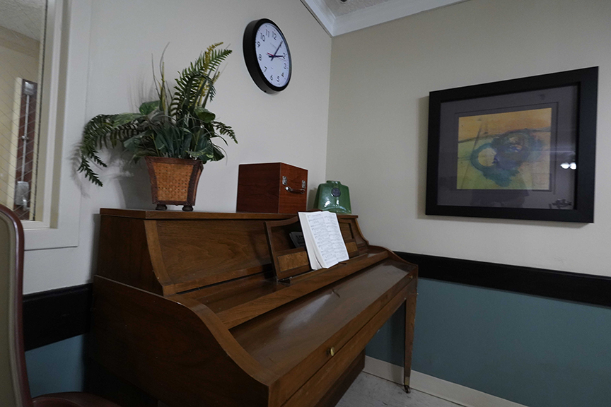 Piano in dining room- Arbors West